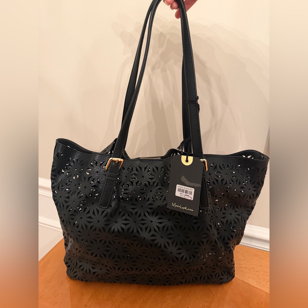 Moda Luxe Black Laser-Cut Tote with Gold Hardware